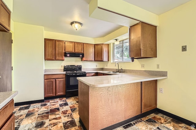 4758 S Mocha Dr W, Taylorsville, UT 84129 - kitchen featuring black range with electric cooktop, a peninsula, light countertops, under cabinet range hood, and a sink