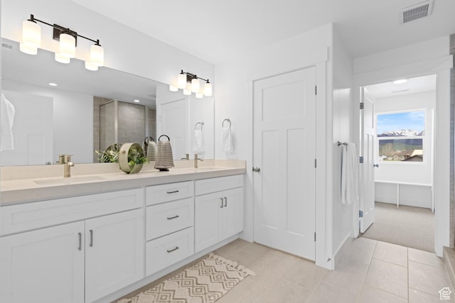 544 N 350 W Unit 7R, Morgan, UT 84050 - full bathroom featuring a stall shower, double vanity, tile patterned floors, recessed lighting, and baseboards