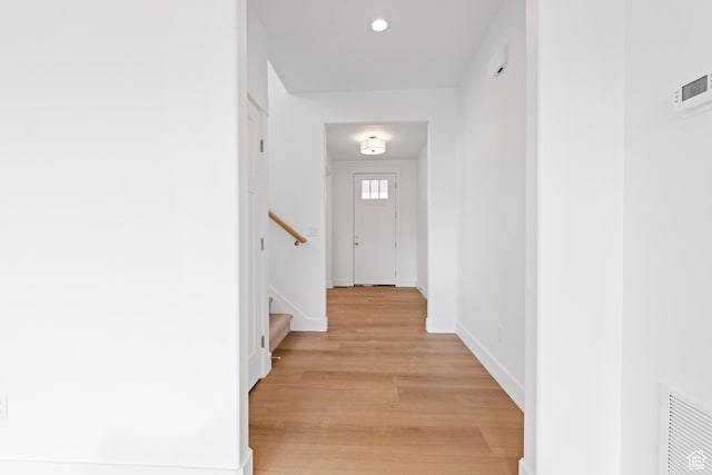 544 N 350 W Unit 7R, Morgan, UT 84050 - hallway with light wood finished floors, stairs, baseboards, and recessed lighting