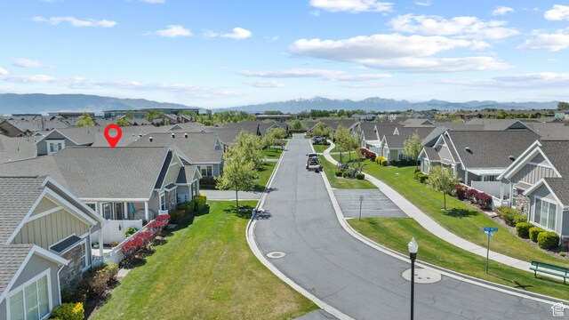 bird's eye view with a residential view and a mountain view