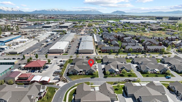 birds eye view of property featuring a mountain view and a residential view