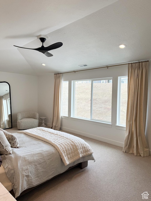 7648 S Iron Cyn Unit 341, West Jordan, UT 84081 - bedroom featuring light colored carpet, recessed lighting, baseboards, and visible vents