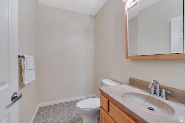 7812 N Crestwood Cir, Eagle Mountain, UT 84005 - bathroom featuring toilet, vanity, and baseboards