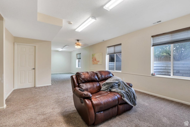 7812 N Crestwood Cir, Eagle Mountain, UT 84005 - living area featuring carpet flooring, baseboards, and ceiling fan