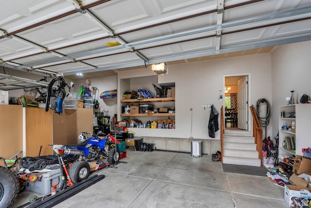 7812 N Crestwood Cir, Eagle Mountain, UT 84005 - garage featuring a garage door opener