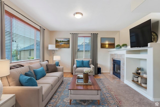 7812 N Crestwood Cir, Eagle Mountain, UT 84005 - living area featuring a tiled fireplace and baseboards