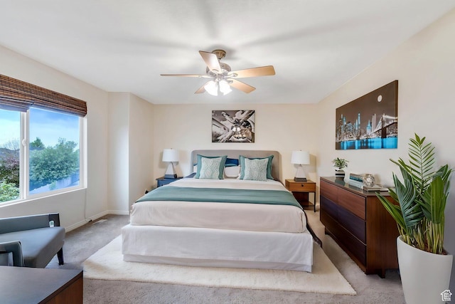 7812 N Crestwood Cir, Eagle Mountain, UT 84005 - bedroom with light colored carpet, ceiling fan, and baseboards