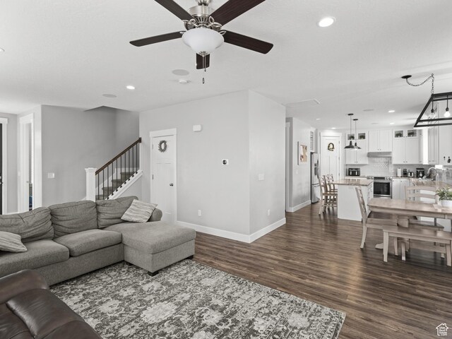 1227 W 20 S, Pleasant Grove, UT 84062 - living area featuring dark wood-style flooring, ceiling fan, recessed lighting, and baseboards