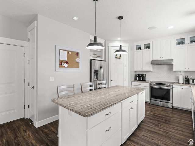 1227 W 20 S, Pleasant Grove, UT 84062 - kitchen with decorative backsplash, dark wood-style flooring, under cabinet range hood, light stone counters, and stainless steel appliances