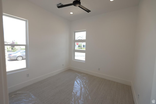 3842 S Kennedy Ln Unit 124, Washington, UT 84780 - empty room featuring ceiling fan, light colored carpet, visible vents, baseboards, and recessed lighting