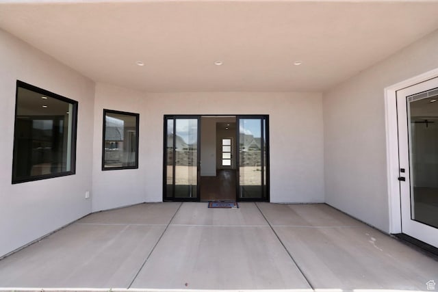 3842 S Kennedy Ln Unit 124, Washington, UT 84780 - entrance to property with a patio and stucco siding