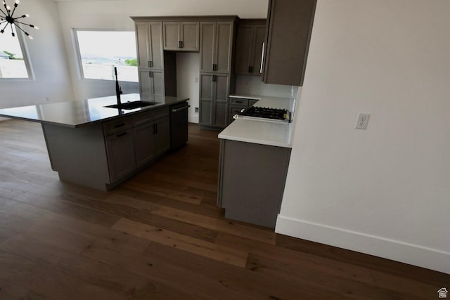 3842 S Kennedy Ln Unit 124, Washington, UT 84780 - kitchen featuring black dishwasher, dark wood-style floors, a sink, and a center island