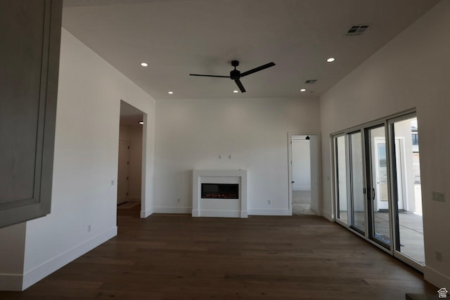 3842 S Kennedy Ln Unit 124, Washington, UT 84780 - unfurnished living room with a ceiling fan, a fireplace, wood finished floors, baseboards, and recessed lighting