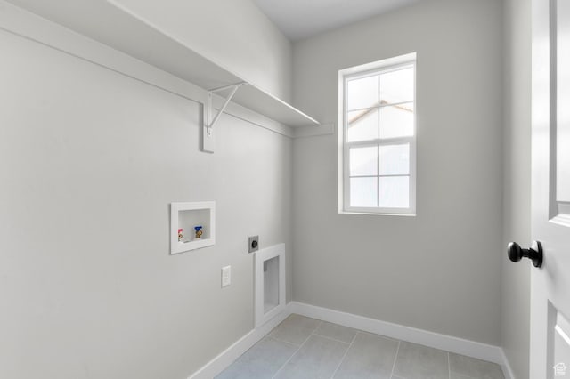 6636 W Spring Snow Ln, Herriman, UT 84096 - laundry room with hookup for an electric dryer, washer hookup, and light tile patterned floors