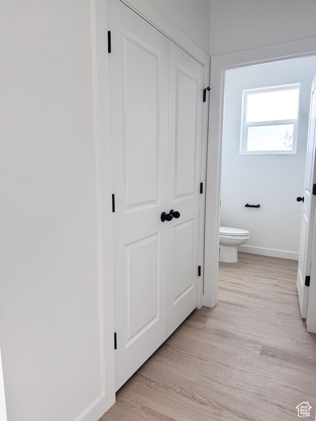 189 N Woodrun Way Unit 131, Saratoga Springs, UT 84045 - hall with baseboards and light wood-type flooring
