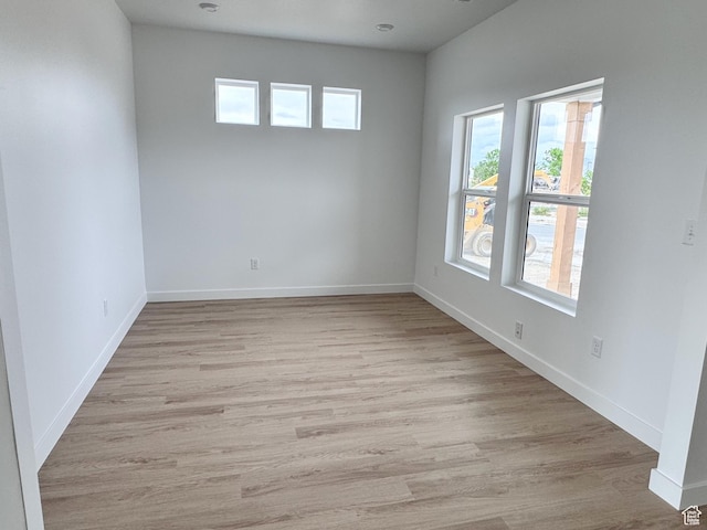 189 N Woodrun Way Unit 131, Saratoga Springs, UT 84045 - unfurnished room featuring light wood finished floors and baseboards