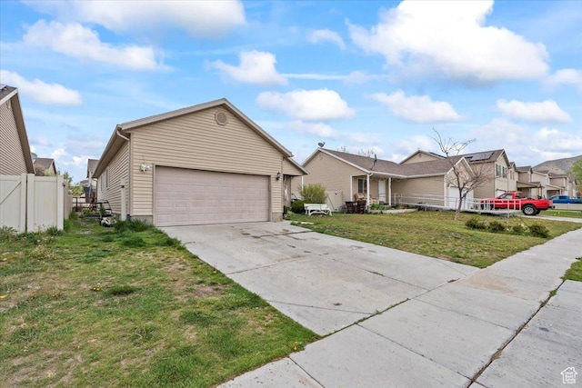 2099 E Hickock Way, Eagle Mountain, UT 84005 - single story home with driveway, an attached garage, and a residential view