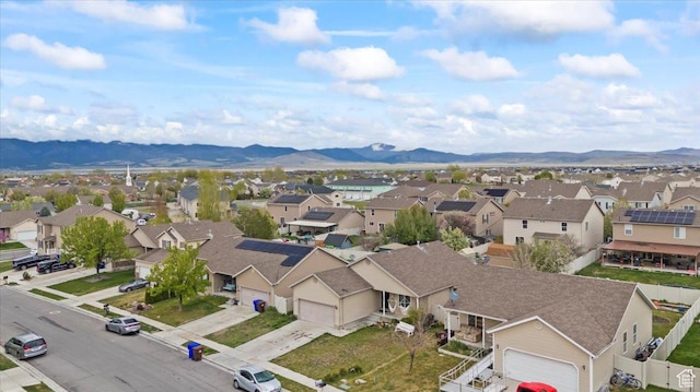 2099 E Hickock Way, Eagle Mountain, UT 84005 - aerial view of residential area featuring a mountainous background