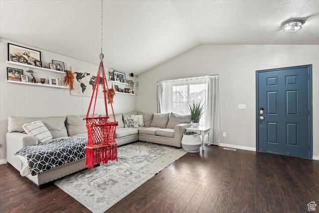 2099 E Hickock Way, Eagle Mountain, UT 84005 - living area featuring dark wood-style floors, lofted ceiling, and baseboards