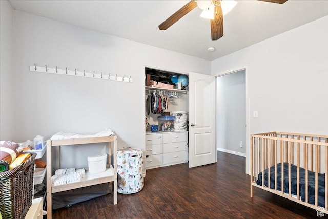 2099 E Hickock Way, Eagle Mountain, UT 84005 - bedroom with wood finished floors, a closet, ceiling fan, and baseboards