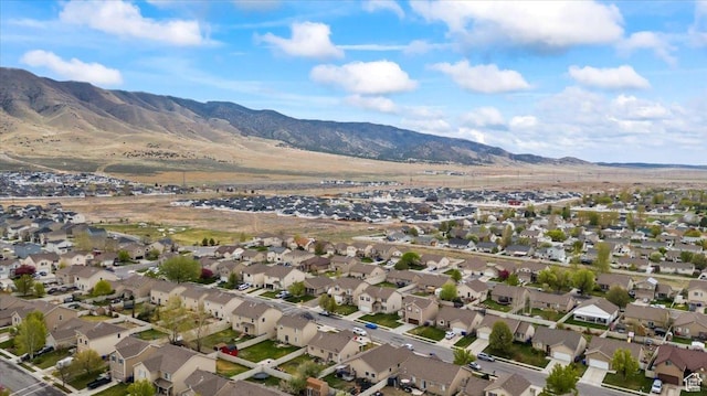 2099 E Hickock Way, Eagle Mountain, UT 84005 - aerial view of property and surrounding area featuring nearby suburban area and mountains