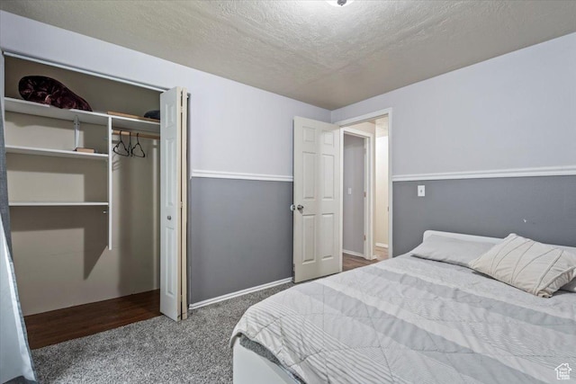 2099 E Hickock Way, Eagle Mountain, UT 84005 - bedroom with a closet, carpet, and a textured ceiling