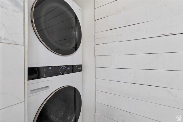 2099 E Hickock Way, Eagle Mountain, UT 84005 - clothes washing area with stacked washing machine and dryer