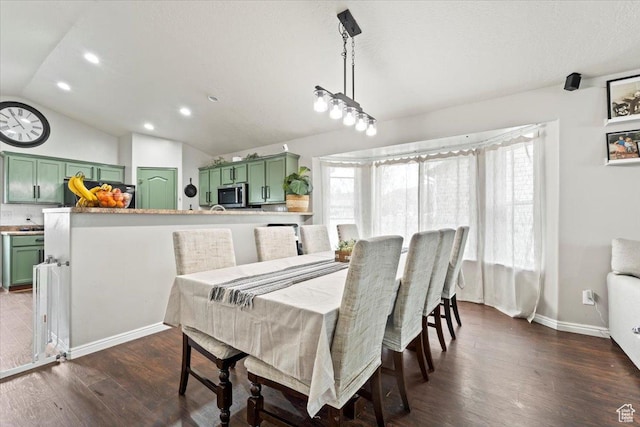 2099 E Hickock Way, Eagle Mountain, UT 84005 - dining space with vaulted ceiling, dark wood-style flooring, recessed lighting, and baseboards