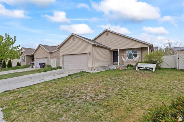 2099 E Hickock Way, Eagle Mountain, UT 84005 - ranch-style home featuring an attached garage, concrete driveway, and a gate