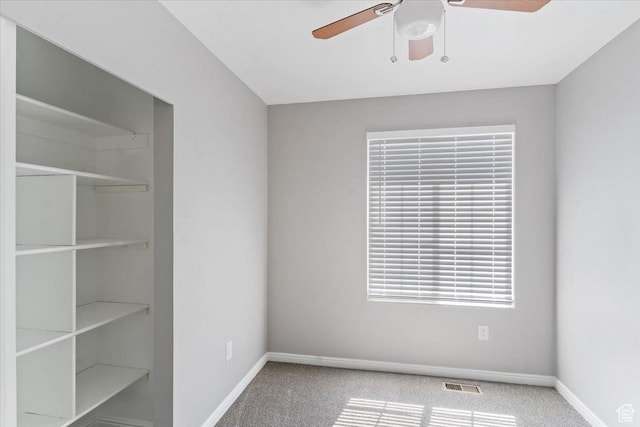 8522 S Kolby Ln, Midvale, UT 84047 - unfurnished bedroom featuring carpet, baseboards, a ceiling fan, and a closet