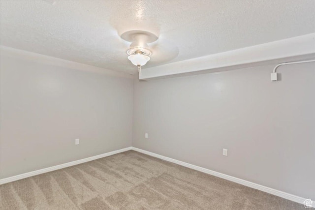 8522 S Kolby Ln, Midvale, UT 84047 - carpeted empty room featuring a textured ceiling and baseboards