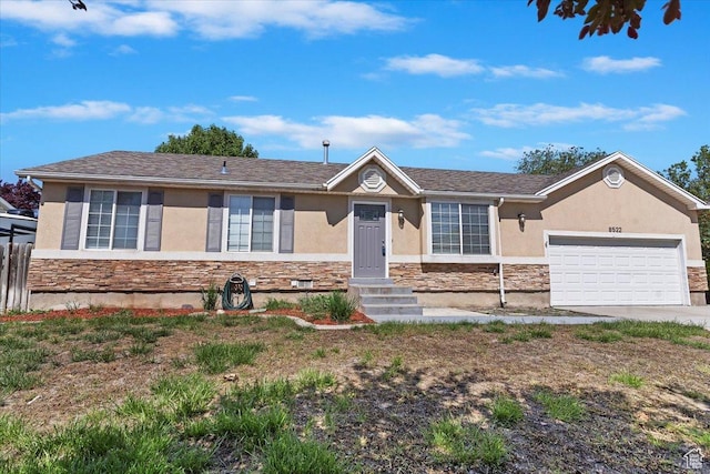 8522 S Kolby Ln, Midvale, UT 84047 - ranch-style house with stone siding, stucco siding, a garage, and concrete driveway