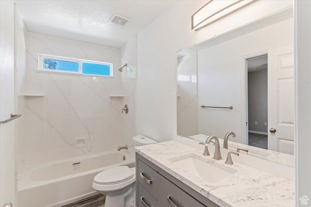 8522 S Kolby Ln, Midvale, UT 84047 - full bathroom featuring toilet, vanity, bathtub / shower combination, and a textured ceiling