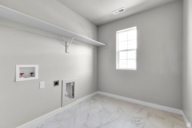 6644 W Spring Snow Ln, Herriman, UT 84096 - laundry room with hookup for an electric dryer, marble look tile flooring, and washer hookup