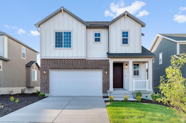 6644 W Spring Snow Ln, Herriman, UT 84096 - view of front of house featuring board and batten siding, driveway, brick siding, and an attached garage