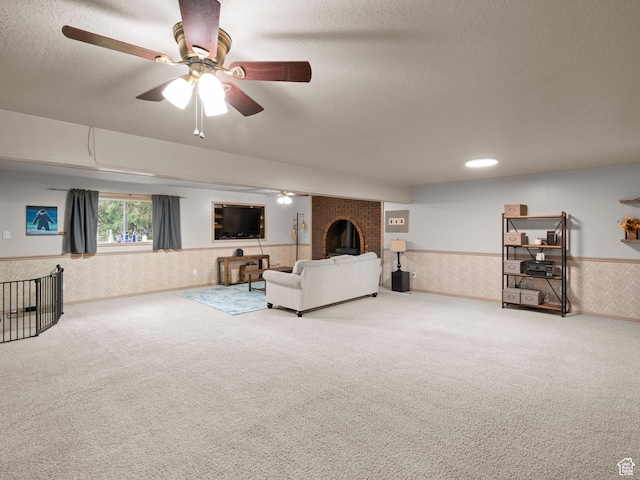 60 N 1000 W, Clearfield, UT 84015 - carpeted living area with a brick fireplace, a textured ceiling, ceiling fan, and wainscoting