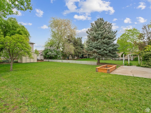 60 N 1000 W, Clearfield, UT 84015 - view of yard with a patio, an outdoor structure, fence, and a storage shed