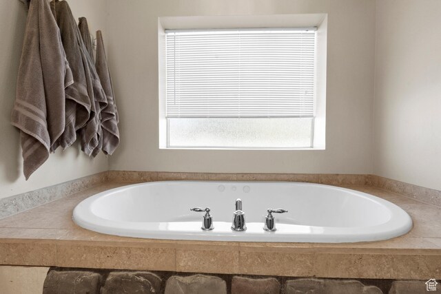 full bathroom featuring a bath