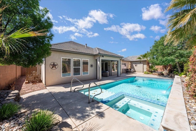 2379 E Crimson Dr, St George, UT 84790 - view of pool featuring a fenced backyard, a pool with connected hot tub, and a patio area