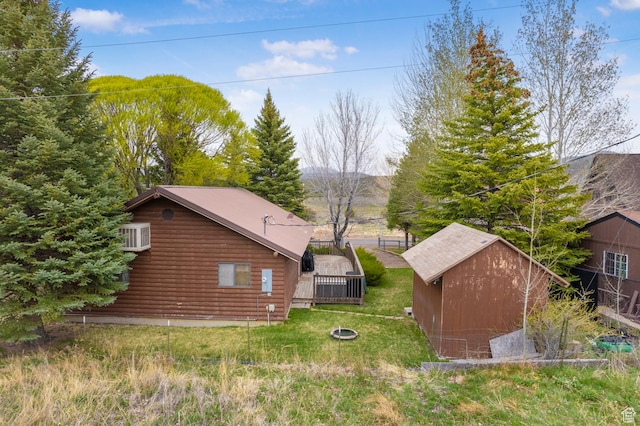 786 W Carter Dr, Pine Valley, UT 84781 - view of side of property featuring log siding, a mountain view, an outbuilding, and a shed