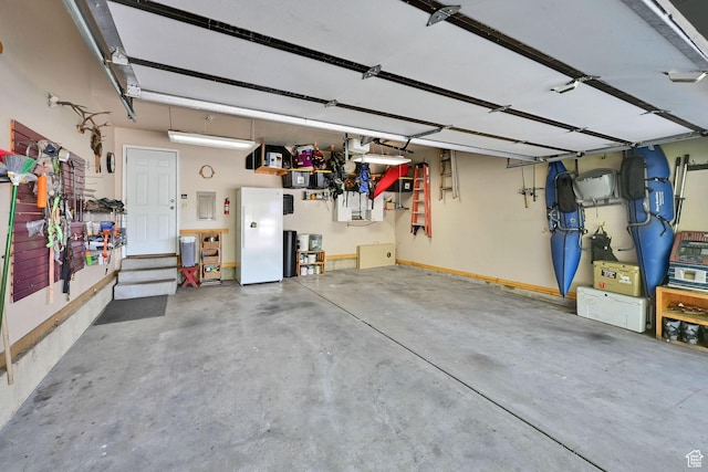 2974 N 1375 E, North Ogden, UT 84414 - garage featuring freestanding refrigerator