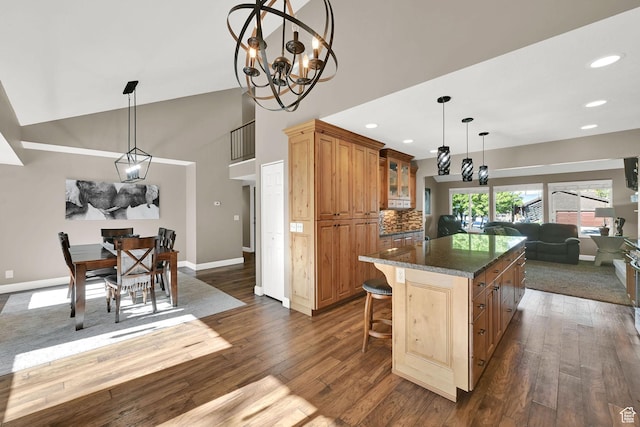 2974 N 1375 E, North Ogden, UT 84414 - kitchen with dark wood-style flooring, high vaulted ceiling, a center island, open floor plan, and glass insert cabinets