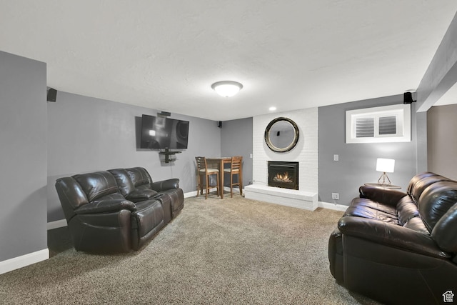 2974 N 1375 E, North Ogden, UT 84414 - living room featuring baseboards, a brick fireplace, and carpet floors