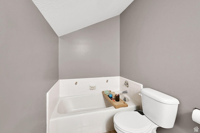 2974 N 1375 E, North Ogden, UT 84414 - bathroom with toilet, vaulted ceiling, and a bath