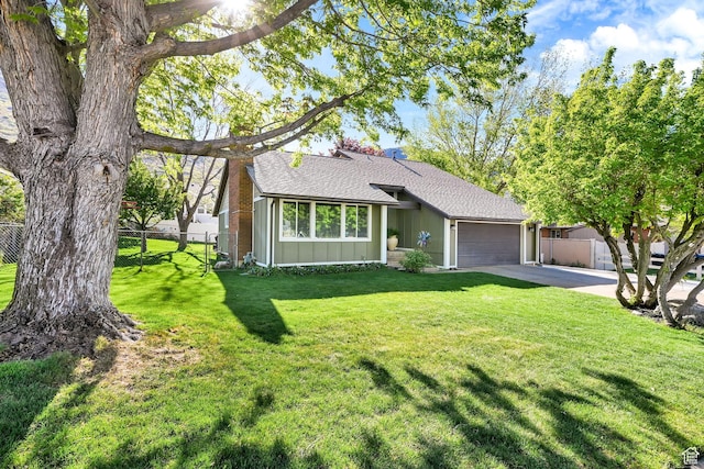 2974 N 1375 E, North Ogden, UT 84414 - ranch-style house featuring a garage, fence, roof with shingles, board and batten siding, and driveway