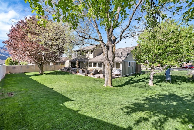 2974 N 1375 E, North Ogden, UT 84414 - view of yard featuring a fenced backyard, outdoor lounge area, and a patio area