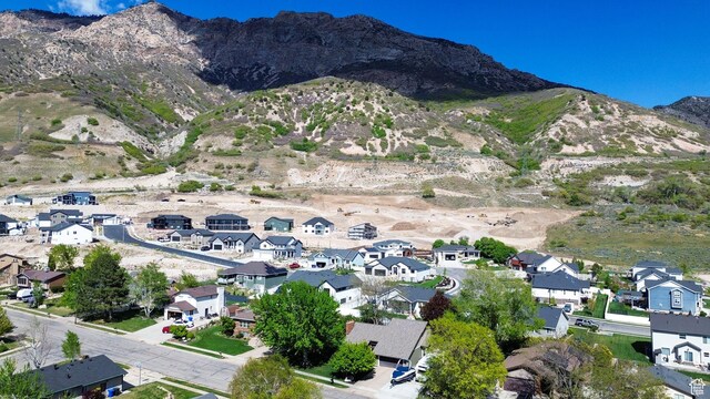 2974 N 1375 E, North Ogden, UT 84414 - drone / aerial view with a residential view and a mountain view