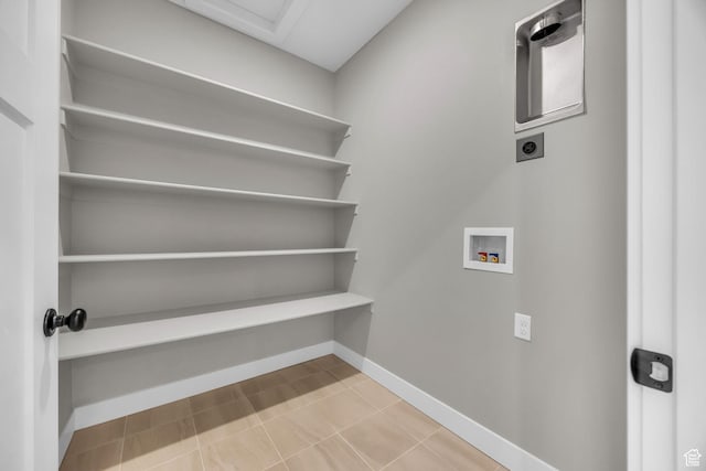 1138 N 1000 E, Mapleton, UT 84664 - laundry area featuring hookup for an electric dryer, washer hookup, baseboards, and tile patterned flooring