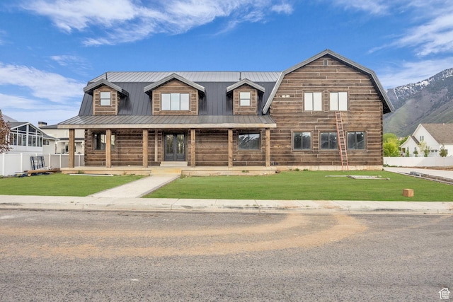 1138 N 1000 E, Mapleton, UT 84664 - view of front of home featuring a porch, a front yard, and metal roof