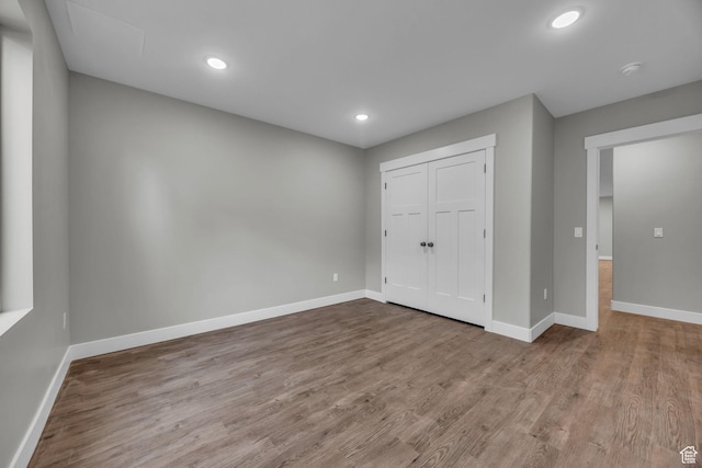 1138 N 1000 E, Mapleton, UT 84664 - unfurnished bedroom featuring wood finished floors, baseboards, recessed lighting, and a closet